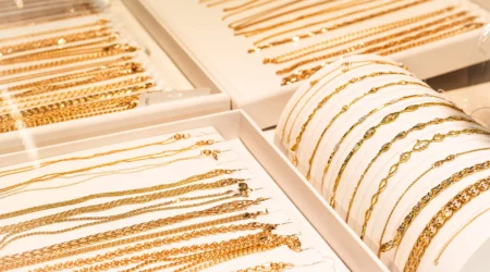 gold chains and bracelets on jewelry display