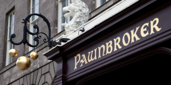 Pawnbroker shop with traditional sign - three gold balls